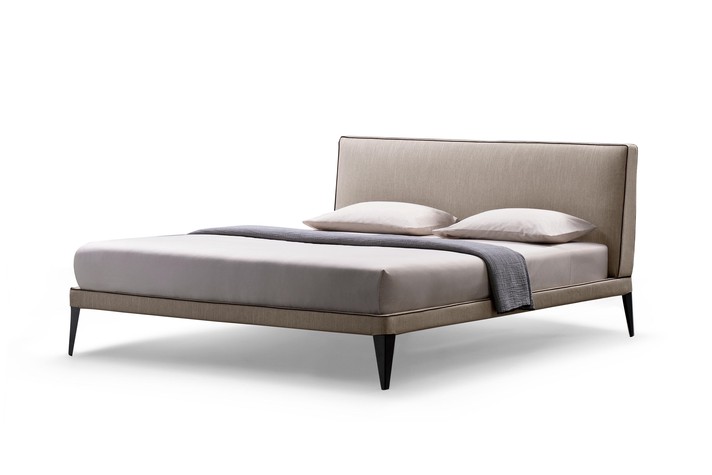 Ein kompaktes Polsterbett mit minimalistischem Look