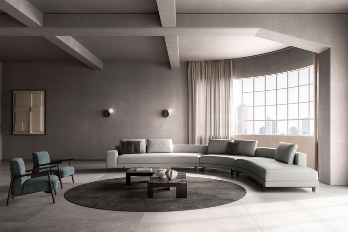 gebogenes Modulsofa mit einer Armlehne und offenem Endelement