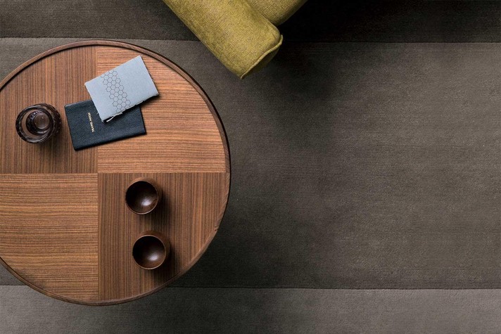Detail of the walnut veneer beautifully crafted in a decorative motif