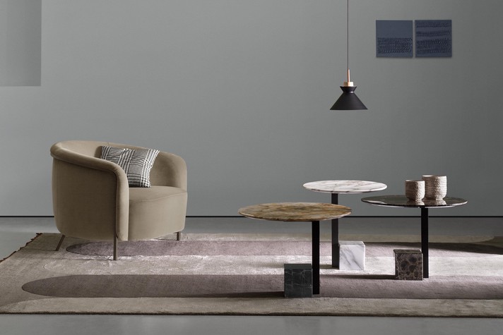 A set of 3 accent tables with marble tops