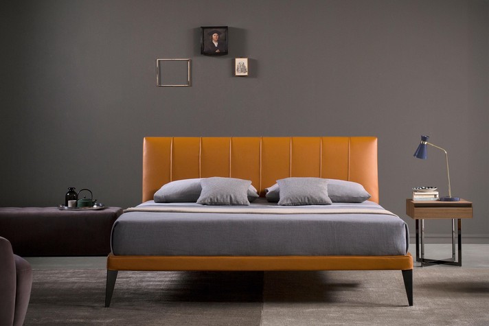 Geometric shapes: a square side table perfectly matched to a streamlined bed