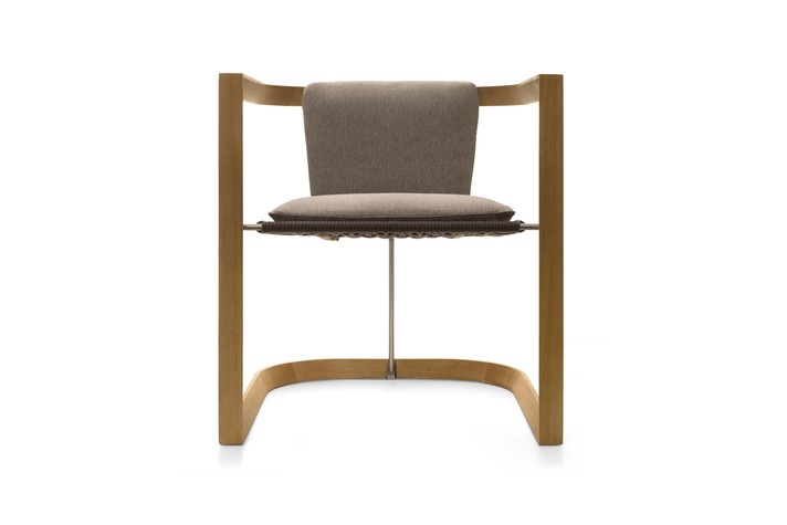 Small armchair in natural stained ash wood