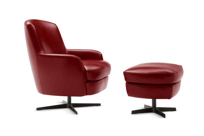 Swivel armchair in red leather with its matching footstool