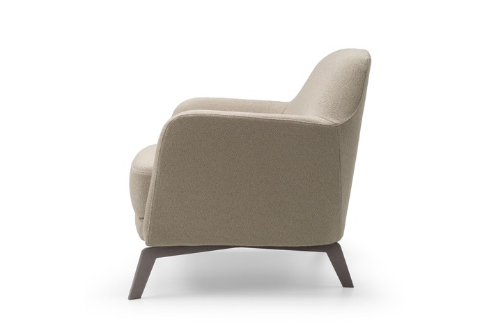 Lateral view of the armchair; a version upholstered in fabric