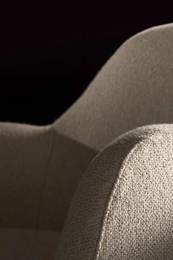 Details of the rounded armrest with the decorative profile