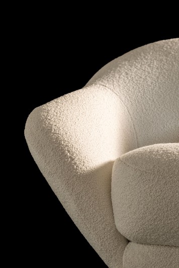 Detail of the arm and generous seat cushion