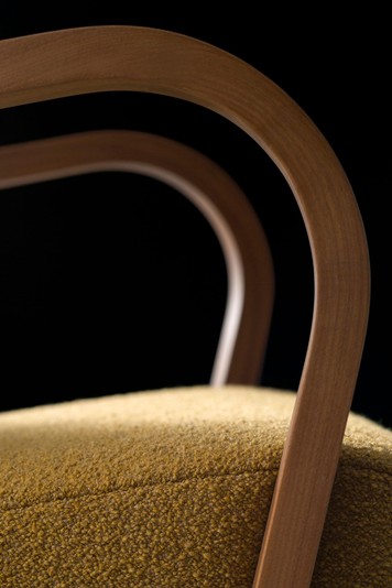 Detail of the solid walnut wood arms