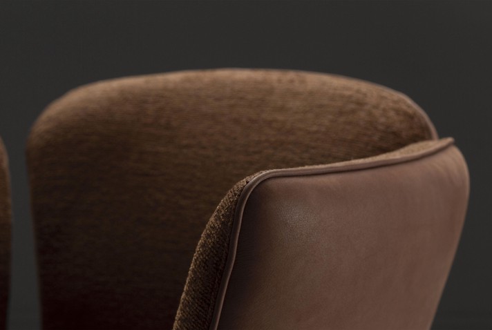 Decorative piping detail on the armrest