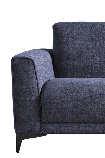Detail of the gently flared arm and generous, thick seat cushion