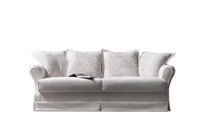 Fabric sofa bed with a cushion backrest in a shabby chic style