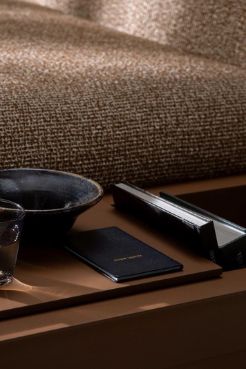 Detail of the storage coffee table serving the seats