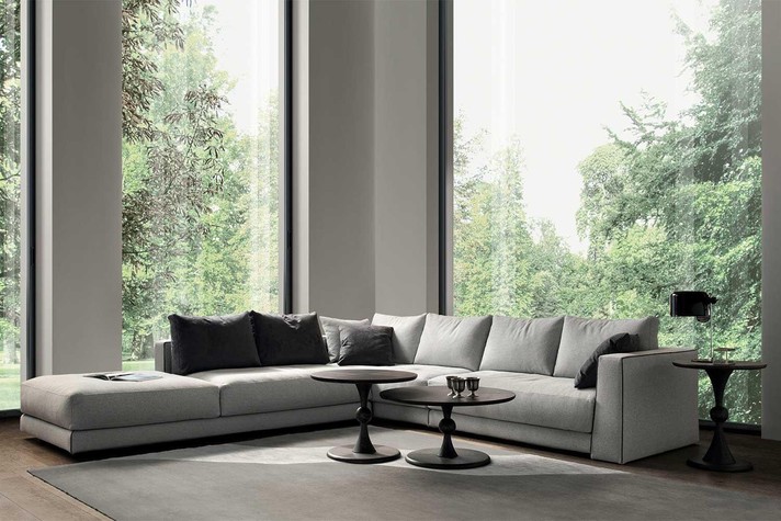 Large corner sofa with open end, wide seat cushions and feather filled backrests