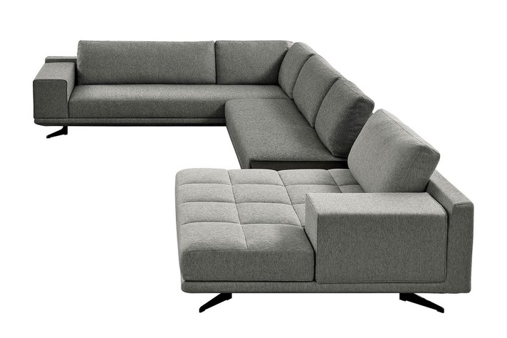 Large panoramic corner sofa with tufted module