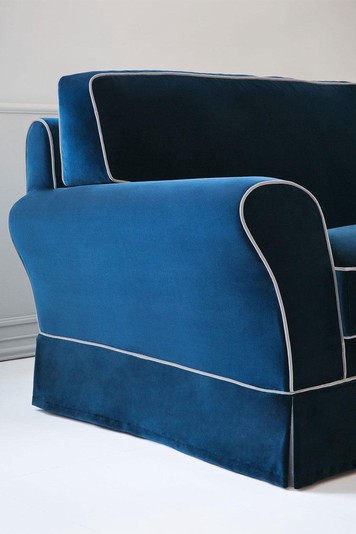 Detail of armrest, skirt and backrests with contrasting cord welt