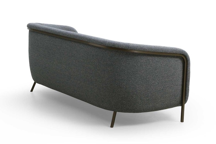 Metal structure embracing the curved backrest