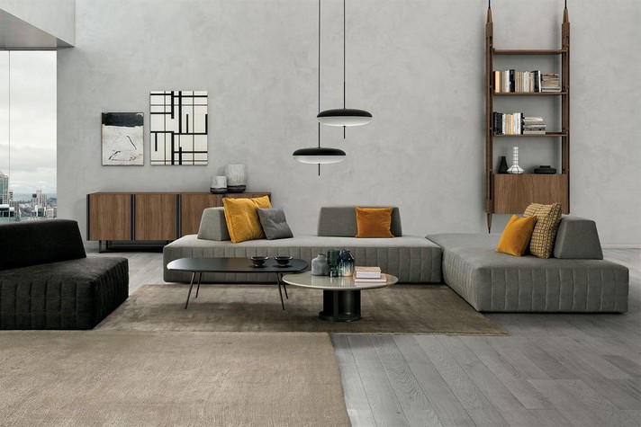 Armchair and sofa in a corner configuration, with weighted cushions