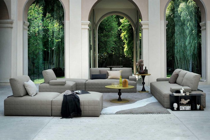 Large living room complete with all types of seating: chaise lounge, corner and 3-seater