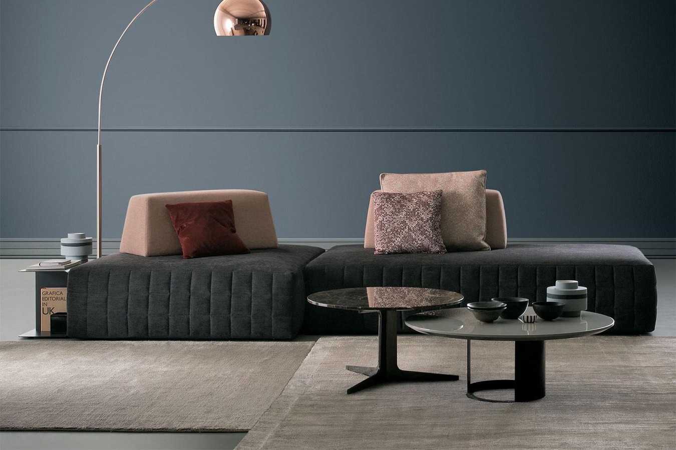 Bespoke low modular sofa, armless, backless, with legless floor skimming seats and weighted back cushions