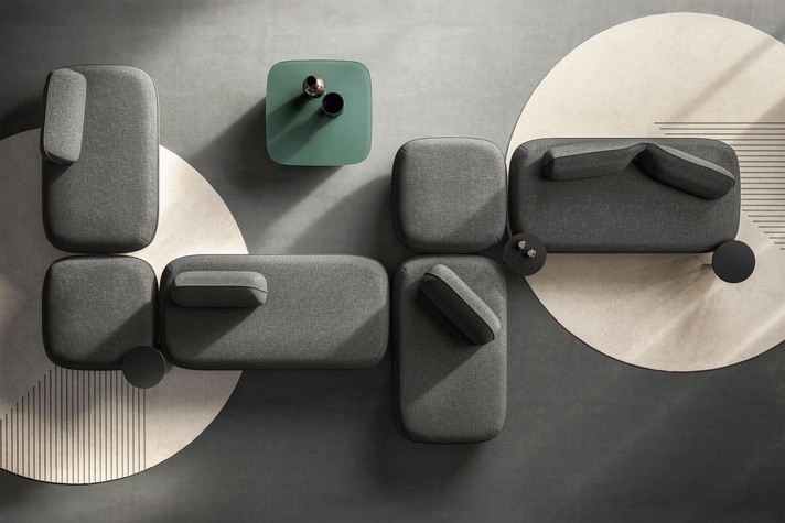 Large modular sofa with an asymmetrical design, ideal in the middle of a room