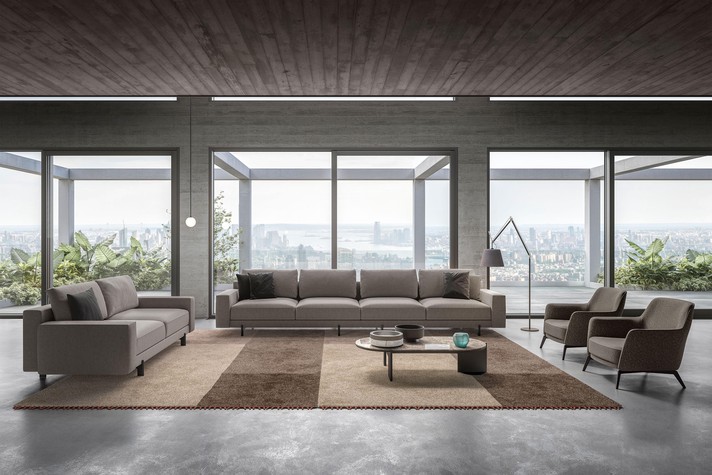 A living room furnished with a pair of linear sofas with 2 / 3 and 4 seats