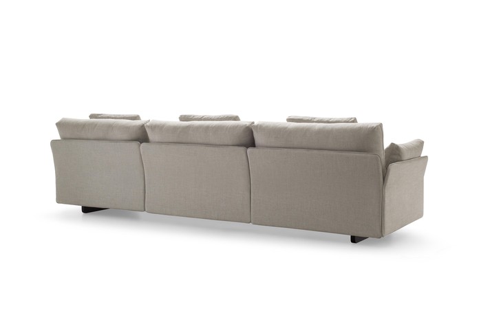 Back view of the sofa covered in fabric