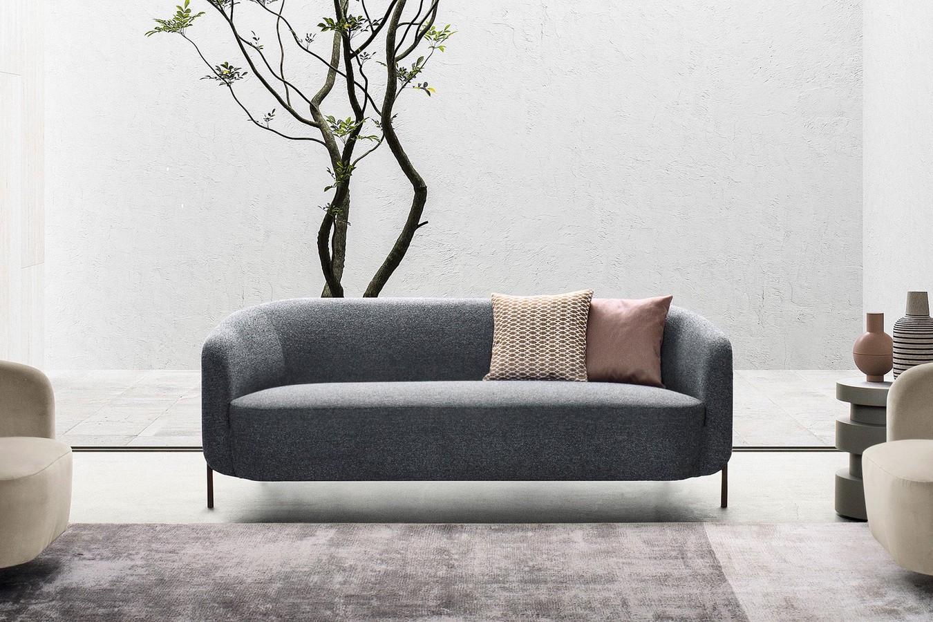 Curved back 2 or 3 seater sofa Ring with sleek metal legs