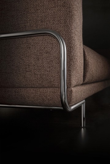 Detail of the metal tube, transitioning into a tall leg