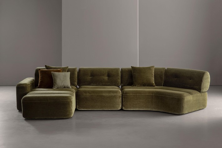Elvis sofa in a configuration with a chaise longue, central module and corner end module