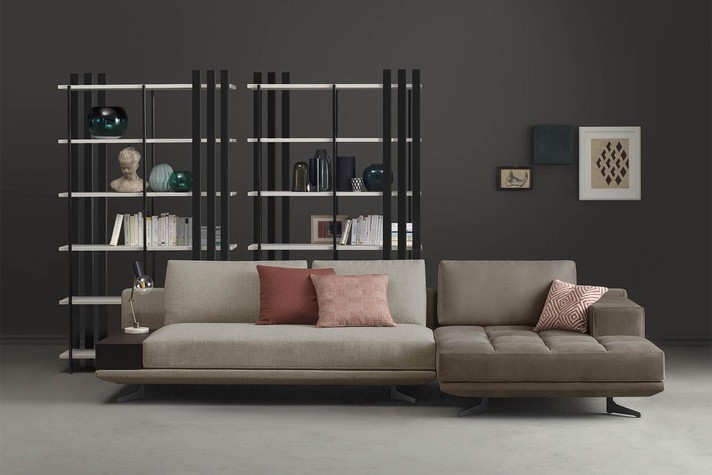 The bookcases complete a double sided sofa and work as stylish room dividers