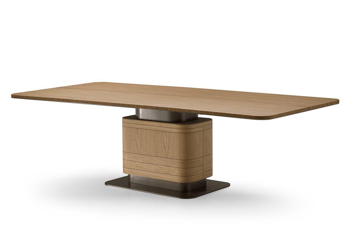 Pilar dining table with a top made from veneered oak wood