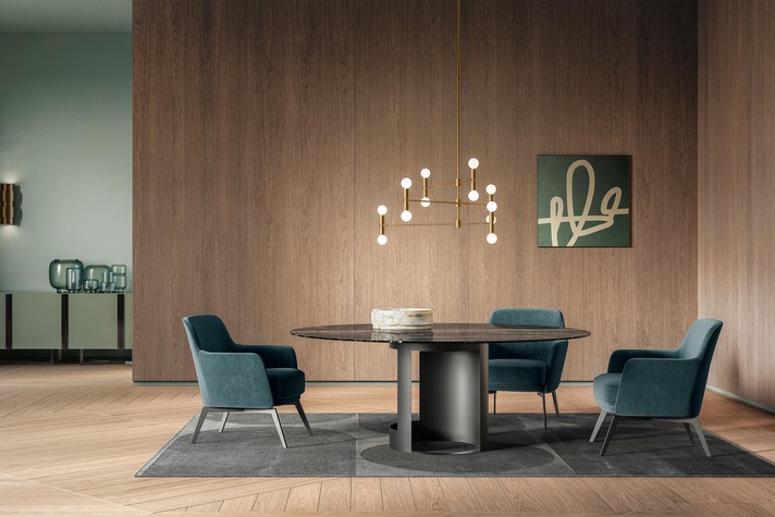 Table with round beveled top in a modern living room Blake