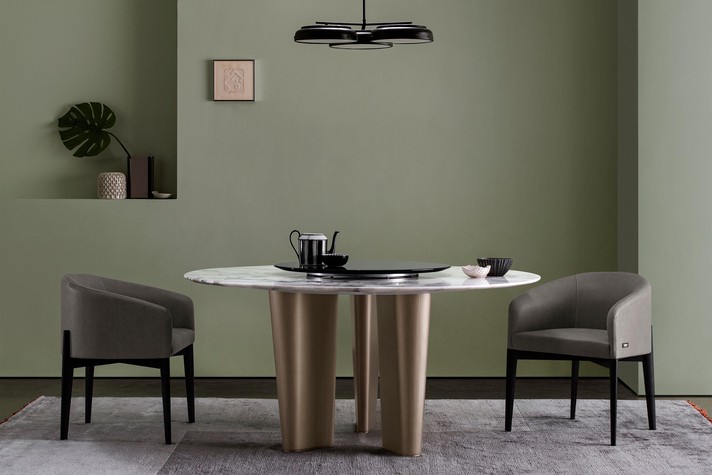 A marble table with an eye catching structure for stylish dining rooms