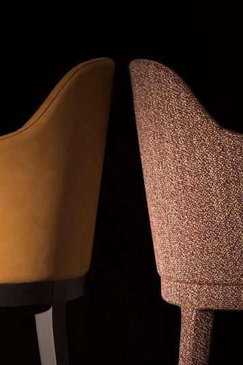 Monica chair with leather or fabric upholstery