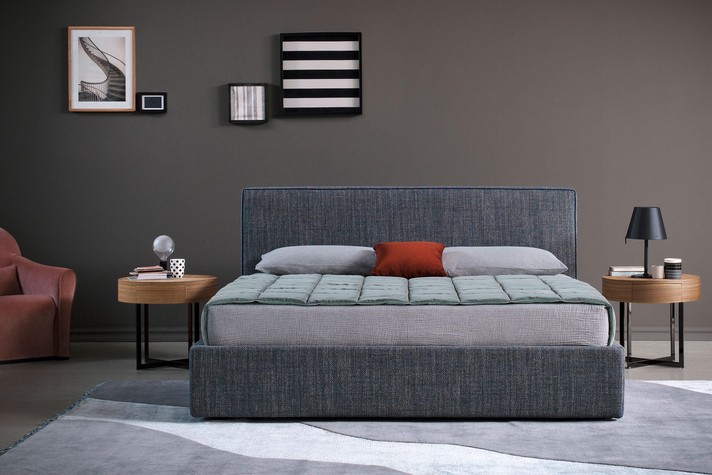 Upholstered bed with front-opening or double-rise container