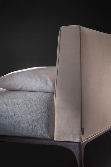 Detail of the headboard of the Milano bed, featuring a contrasting border which highlights the square form