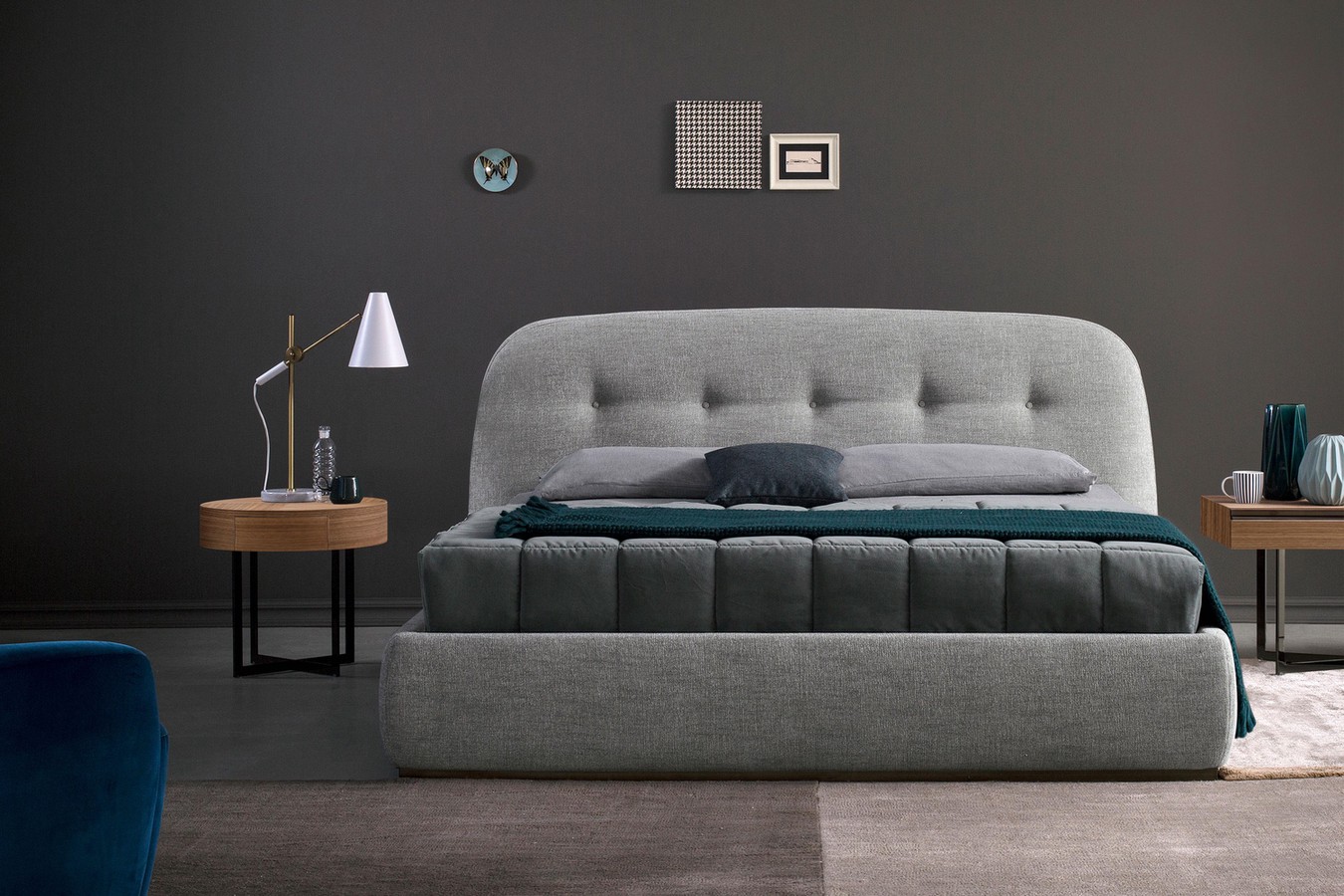 Upholstered king size bed with a button tufted, curved top headboard