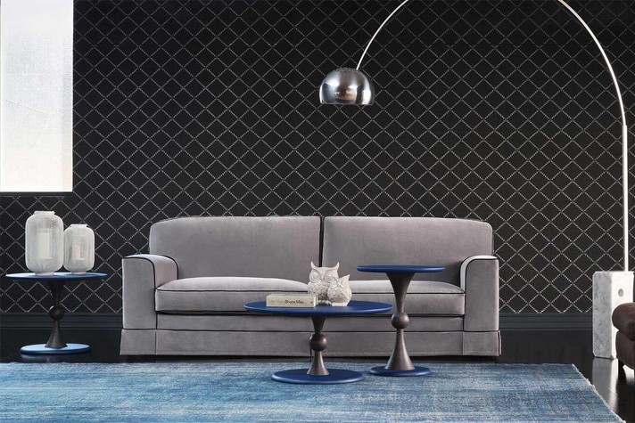 Un divano dalle linee classiche che si adatta alla perfezione ad un salotto contemporaneo