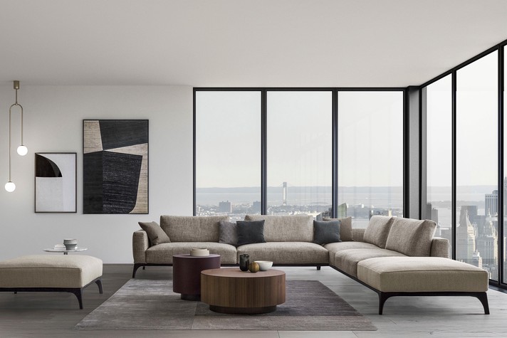 Divano angolare componibile e pouf della collezione Milano