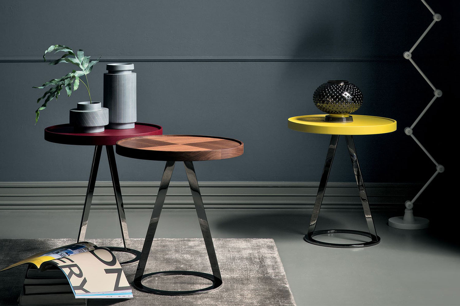 Contemporary 50 cm wide round side table with sculptural cone metal base in black chrome