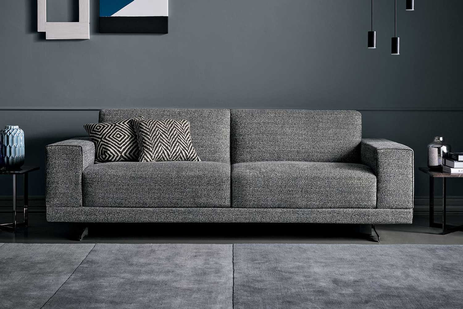 Sectional sofa bed with chrome sled legs