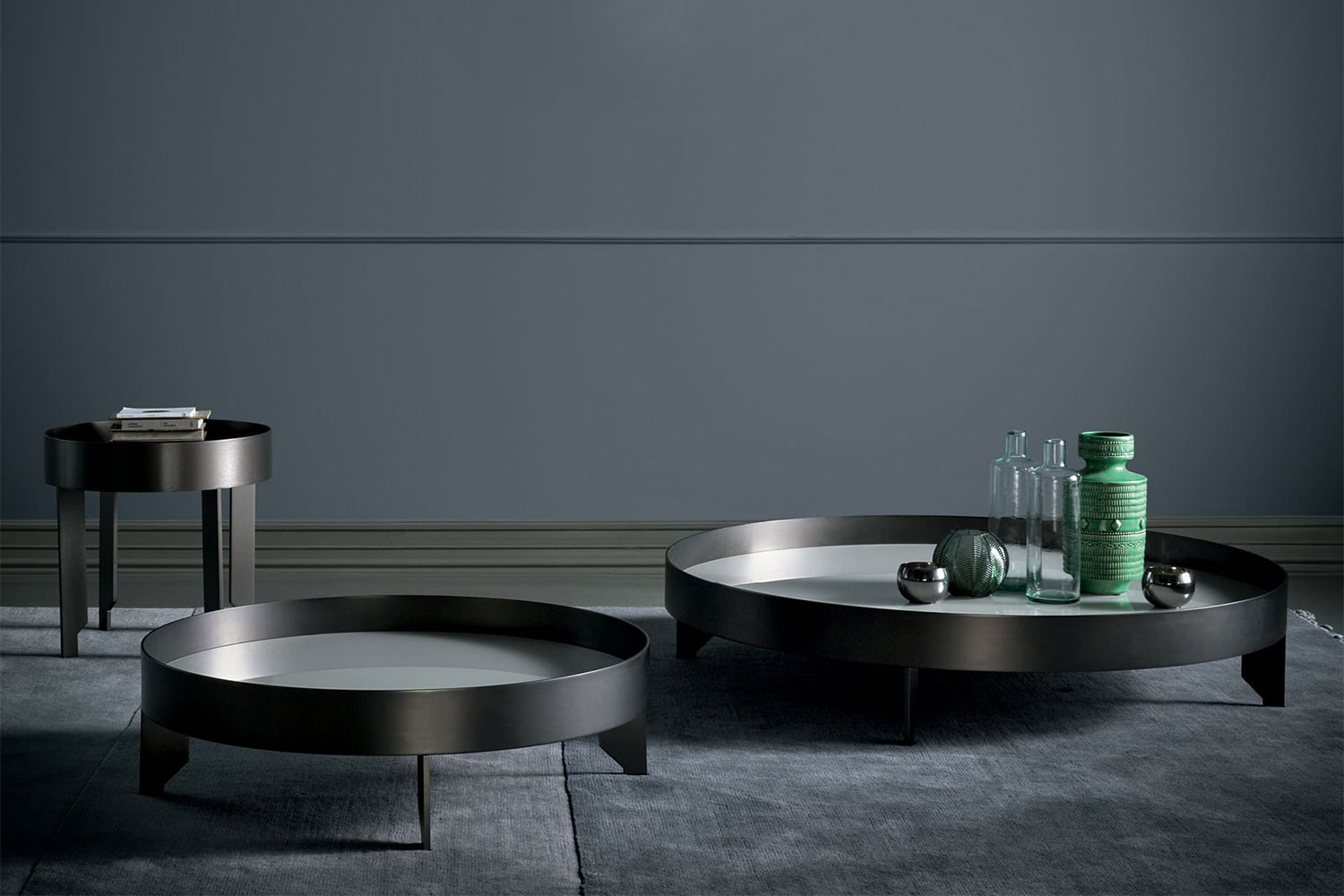 Contemporary round glass and metal coffee tables