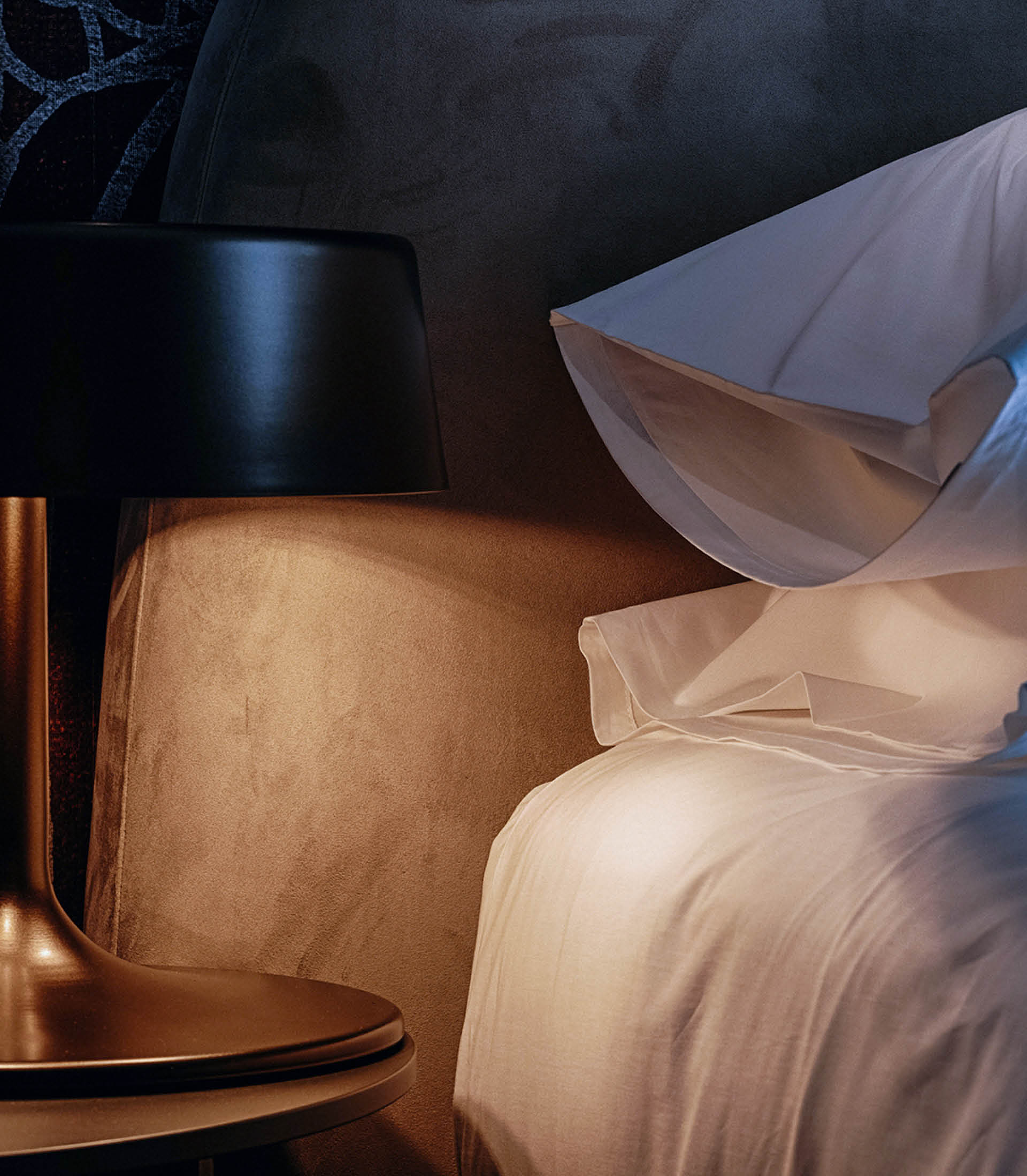 Detail of an upholstered headboard of a bed from the Bodema collection