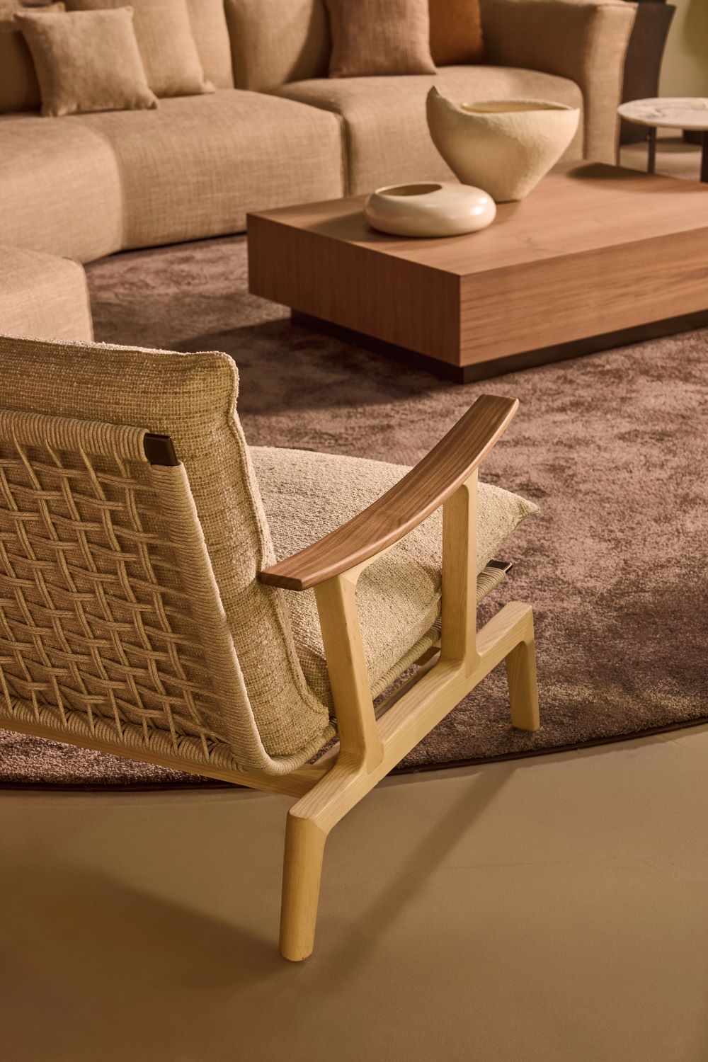 Detail of an armchair with a wooden frame, a new addition to Bodema's collection at the 2026 Salone del Mobile
