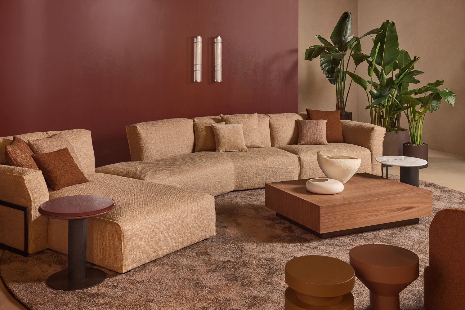 Interni dello stand di Bodema al Salone del Mobile 2026, salotto con divano e tavolini